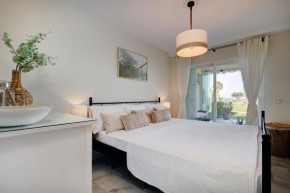 La Cala gorgeous 2 bedroom apartment with stunning gardens, pools and sea views